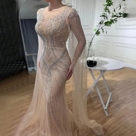 Elegante vestido de noche árabe de sirena color nude con mangas tipo capa y cuentas, vestidos de lujo 2025 para mujer, fiesta de bodas LA72165 