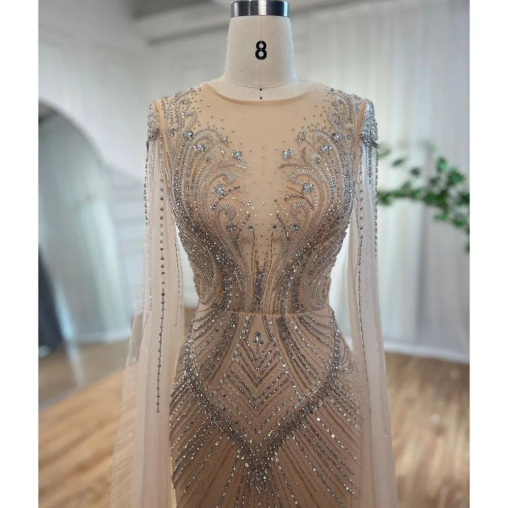 Elegante vestido de noche árabe de sirena color nude con mangas tipo capa y cuentas, vestidos de lujo 2025 para mujer, fiesta de bodas LA72165 