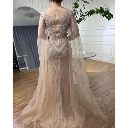 Elegante vestido de noche árabe de sirena color nude con mangas tipo capa y cuentas, vestidos de lujo 2025 para mujer, fiesta de bodas LA72165 