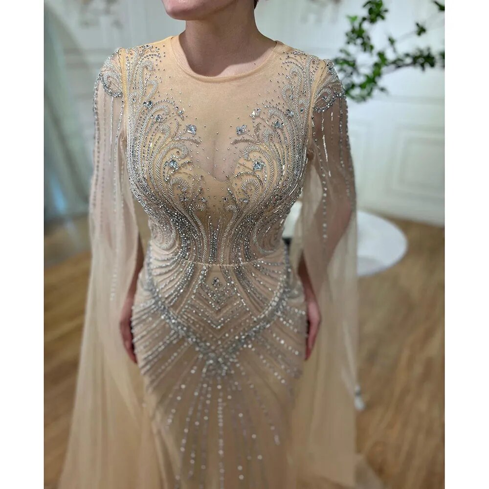 Elegante vestido de noche árabe de sirena color nude con mangas tipo capa y cuentas, vestidos de lujo 2025 para mujer, fiesta de bodas LA72165 