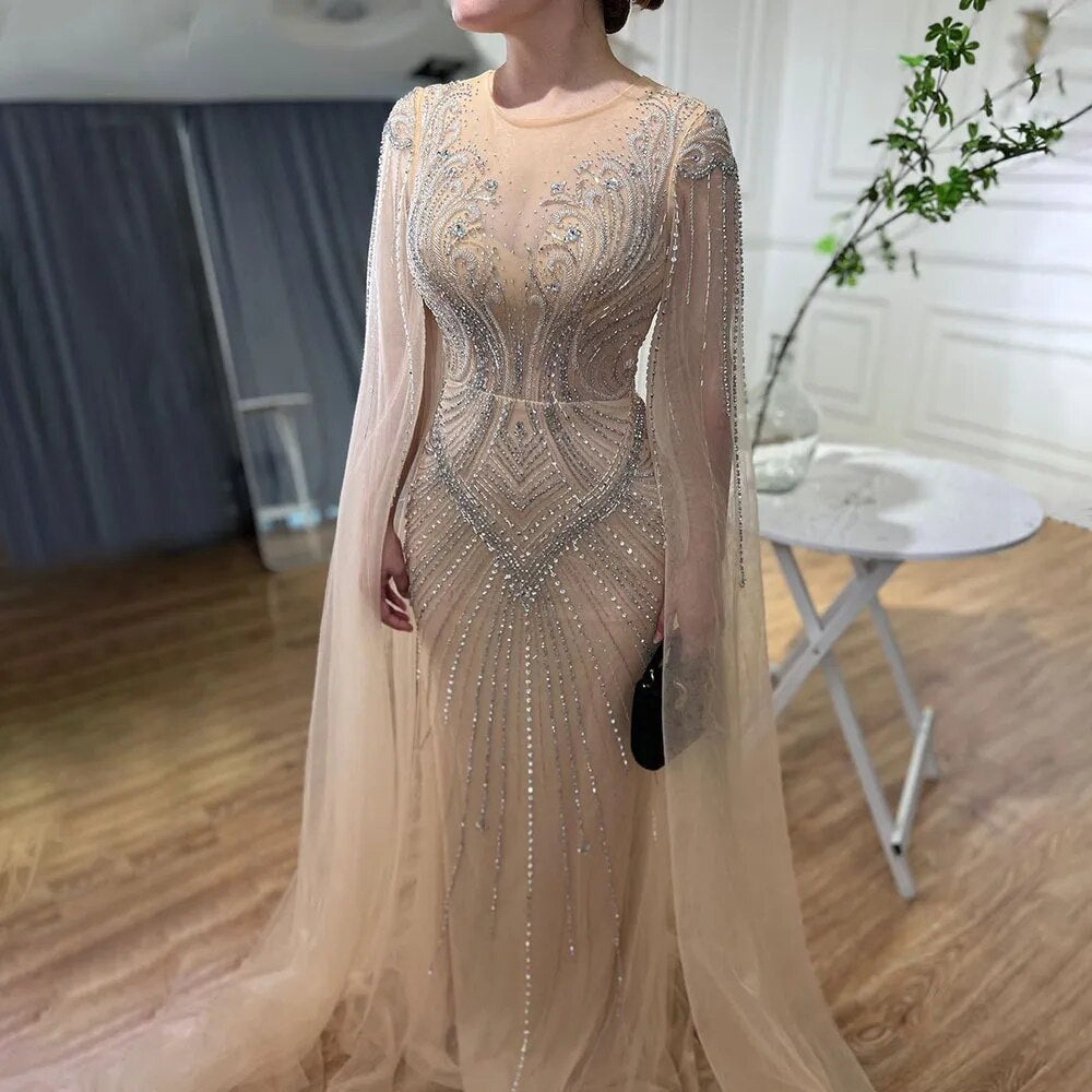 Elegante vestido de noche árabe de sirena color nude con mangas tipo capa y cuentas, vestidos de lujo 2025 para mujer, fiesta de bodas LA72165 