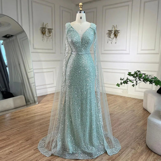 Vestido de noche árabe estilo sirena turquesa estilo Dubái con elegantes mangas de capa con cuentas de lujo para fiesta femenina 2025 LA72574