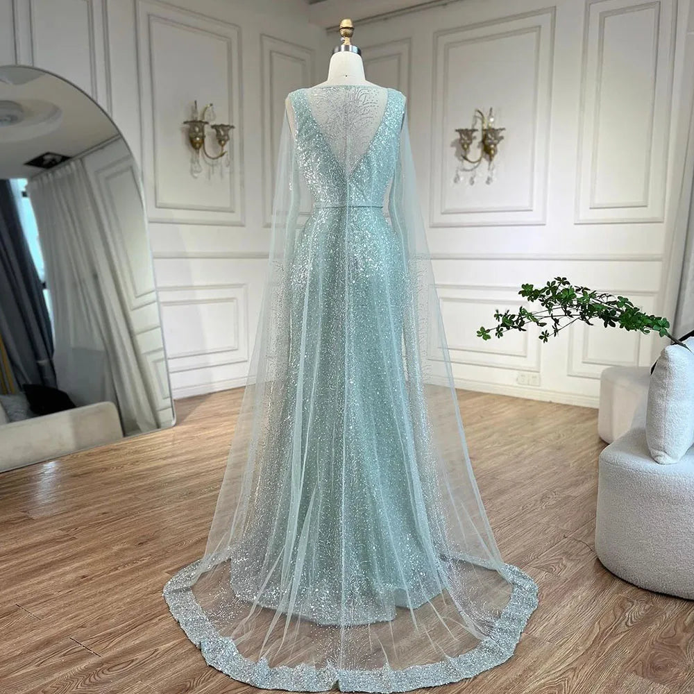 Vestido de noche árabe estilo sirena turquesa estilo Dubái con elegantes mangas de capa con cuentas de lujo para fiesta femenina 2025 LA72574