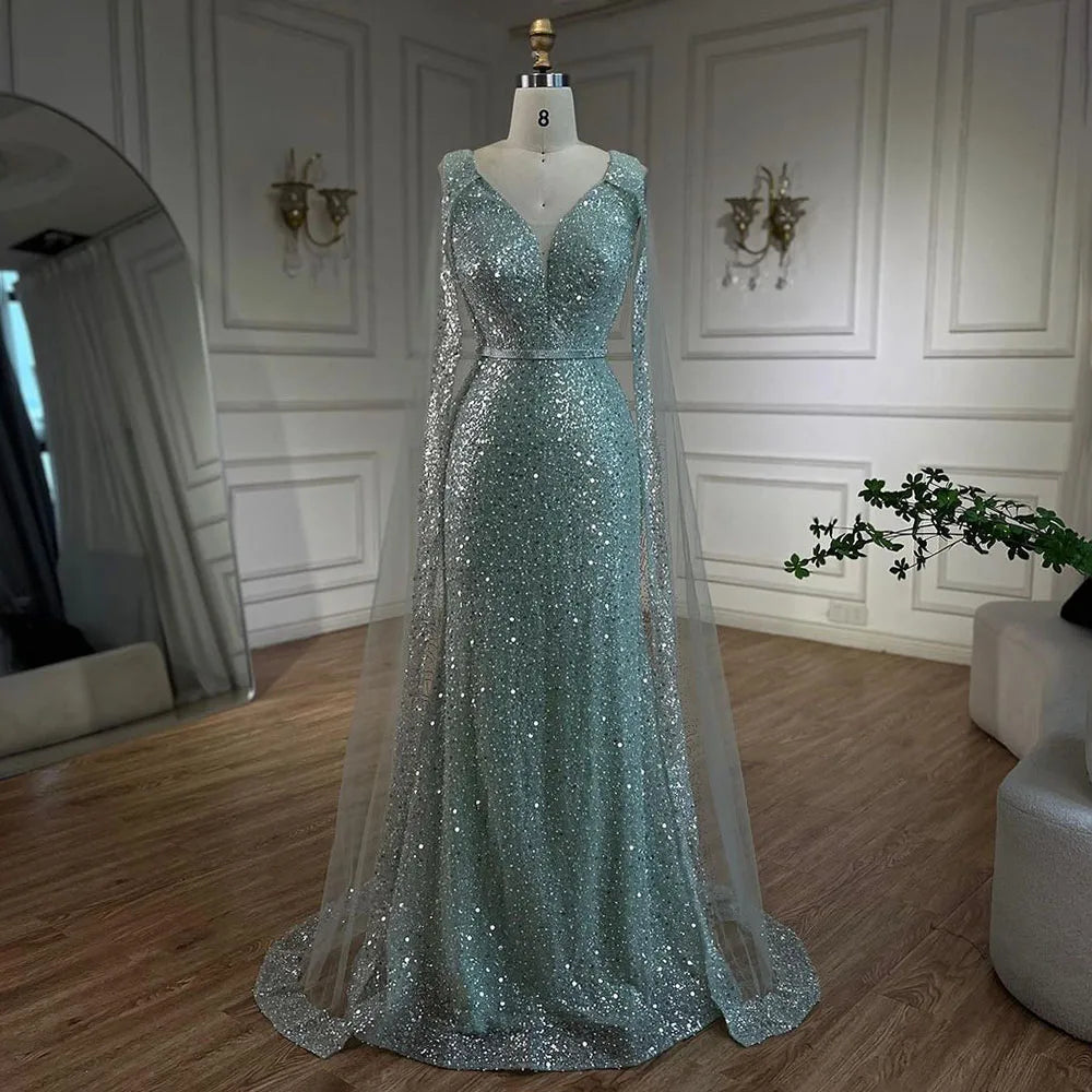 Vestido de noche árabe estilo sirena turquesa estilo Dubái con elegantes mangas de capa con cuentas de lujo para fiesta femenina 2025 LA72574