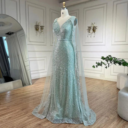 Vestido de noche árabe estilo sirena turquesa estilo Dubái con elegantes mangas de capa con cuentas de lujo para fiesta femenina 2025 LA72574
