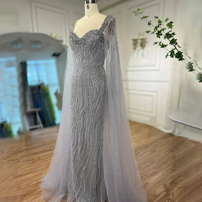 Blaues arabisches Luxus-Abendkleid im Meerjungfrauenstil mit Perlen und Cape-Ärmeln LA71715 