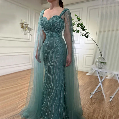 Blaues arabisches Luxus-Abendkleid im Meerjungfrauenstil mit Perlen und Cape-Ärmeln LA71715 