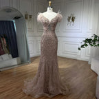 Champagner Meerjungfrau Elegante Abendkleider Diamant Federn Ärmellos Formale Luxus Perlen 2025 LA70350 