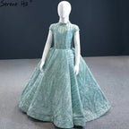 Vestidos de niña de las flores con mangas cortas en azul agua brillante para fiesta y boda 2025 HTA0051 