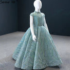Vestidos de niña de las flores con mangas cortas en azul agua brillante para fiesta y boda 2025 HTA0051 