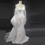 Vestidos de novia elegantes de sirena con encaje de cristal, hombros descubiertos y mangas farol, hechos a medida, estilo Dubái 2025, HA2402 