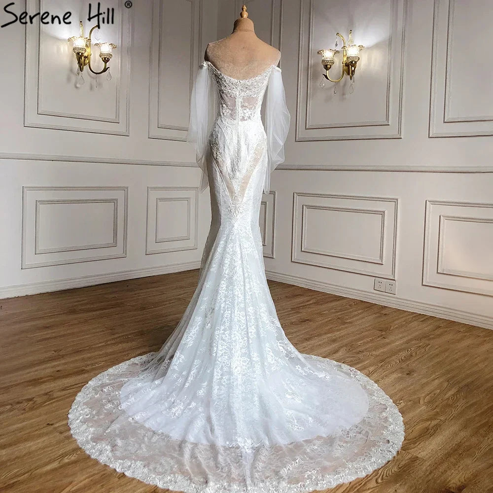 Vestidos de novia elegantes de sirena con encaje de cristal, hombros descubiertos y mangas farol, hechos a medida, estilo Dubái 2025, HA2402 