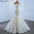 Vestido de novia vintage de sirena color marfil 2025, un hombro, encaje con cuentas, sexy, de alta gama HM67187 