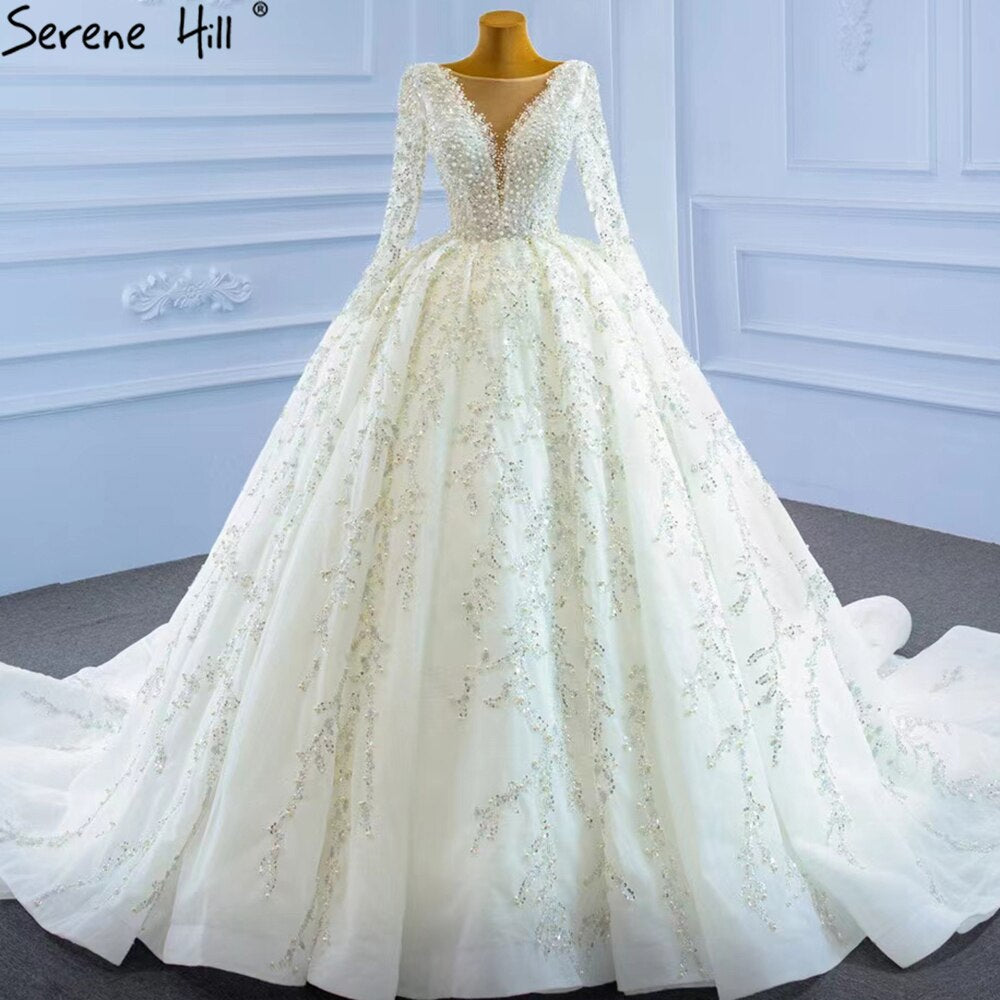 Vestidos de novia musulmanes de lujo en marfil 2025 con cuentas y perlas, vestido de novia HM67260, hecho a medida 
