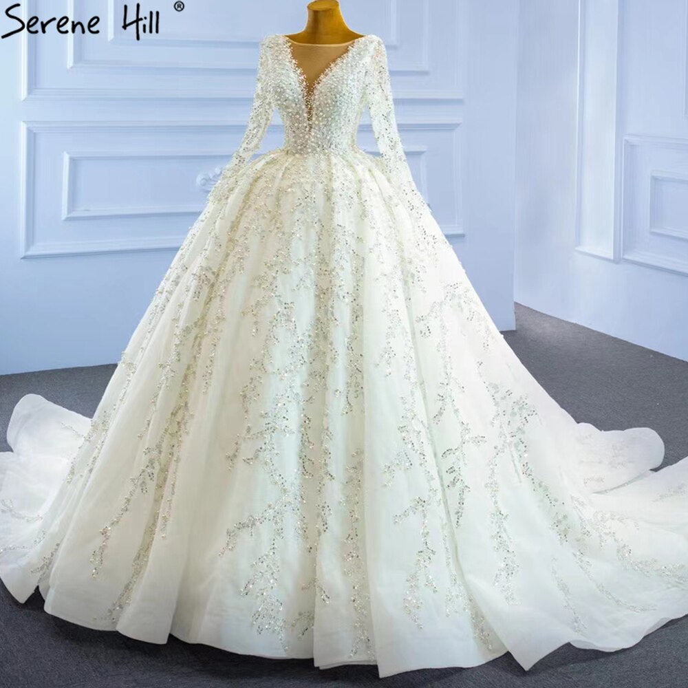Vestidos de novia musulmanes de lujo en marfil 2025 con cuentas y perlas, vestido de novia HM67260, hecho a medida 