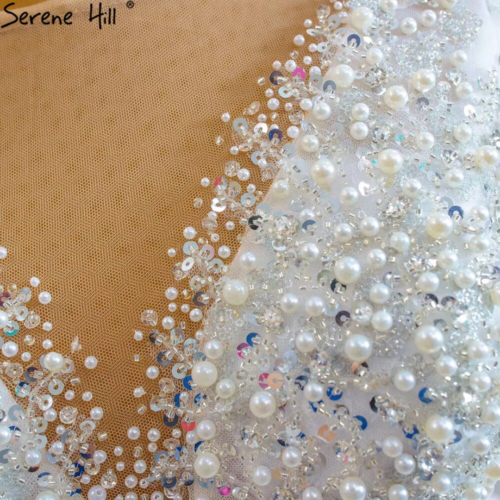 Vestidos de novia musulmanes de lujo en marfil 2025 con cuentas y perlas, vestido de novia HM67260, hecho a medida 