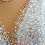 Vestidos de novia musulmanes de lujo en marfil 2025 con cuentas y perlas, vestido de novia HM67260, hecho a medida 