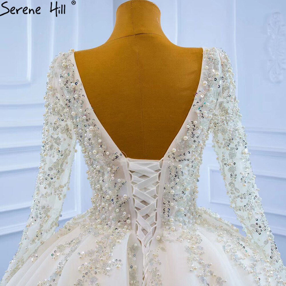 Vestidos de novia musulmanes de lujo en marfil 2025 con cuentas y perlas, vestido de novia HM67260, hecho a medida 
