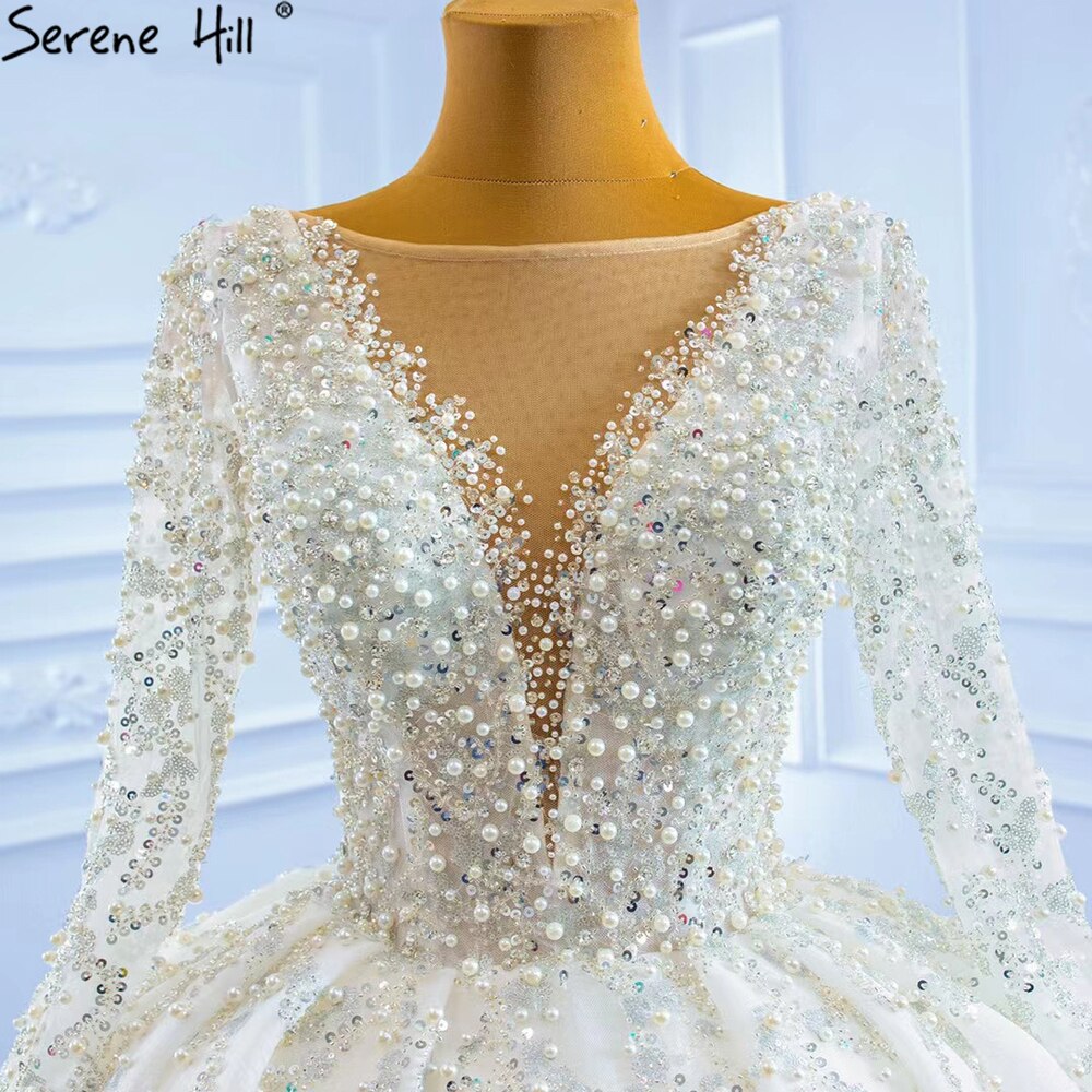 Vestidos de novia musulmanes de lujo en marfil 2025 con cuentas y perlas, vestido de novia HM67260, hecho a medida 