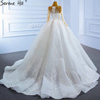 Vestidos de novia musulmanes blancos de lujo 2025 con mangas largas brillantes y encaje de alta gama HM67235 
