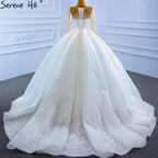 Vestidos de novia musulmanes blancos de lujo 2025 con mangas largas brillantes y encaje de alta gama HM67235 
