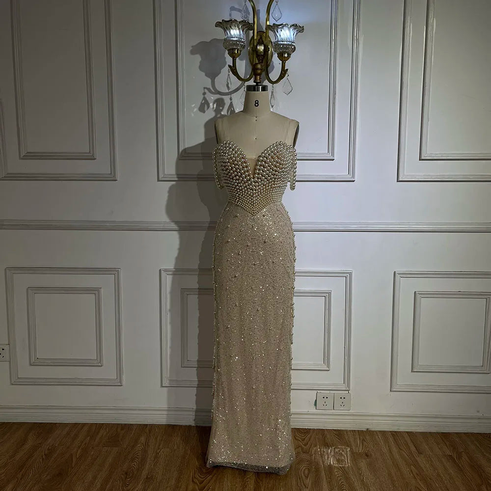 Nudefarbenes Meerjungfrauen-Abendkleid mit Spaghettiträgern und Perlenbesatz – Luxuriöses Dubai-Kleid für die Hochzeitsfeier der Frau LA72393 