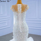 Vestido de novia blanco de lujo estilo sirena 2025, elegante vestido de novia con volantes y cuentas HM67291 