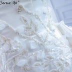 Vestidos de novia con sobrefalda de sirena blanca 2025, elegantes vestidos de novia con flores y cuentas HM67282, hechos a medida 