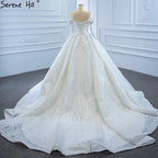 Vestido de novia blanco brillante con hombros descubiertos, mangas largas y cordones, 2025 HM67222 