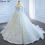 Vestido de novia blanco brillante con hombros descubiertos, mangas largas y cordones, 2025 HM67222 