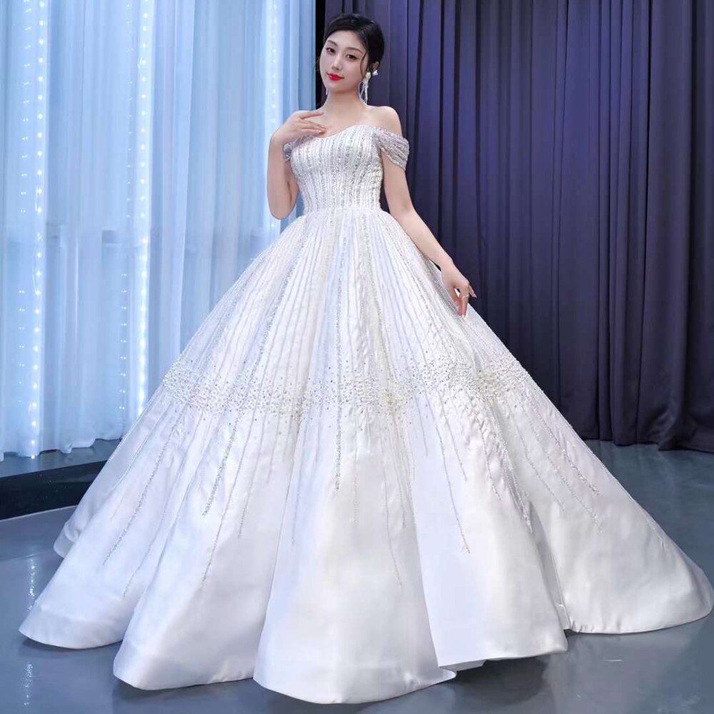 Weiß Sexy Off Schulter Lace Up Luxus Perlen Braut Kleider Hochzeit Kleid 2025 High-End Nach Maß HM67478 