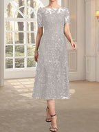 Vestido de madre de la novia de encaje con lentejuelas, corte A, escote ilusión y largo hasta la rodilla