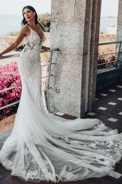 Vestido de novia de tul con escote en V, sin mangas y largo hasta el suelo, con encaje