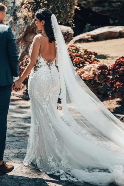 Vestido de novia de tul con escote en V, sin mangas y largo hasta el suelo, con encaje