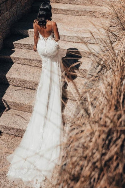 Vestido de novia de tul con escote en V, sin mangas y largo hasta el suelo, con encaje