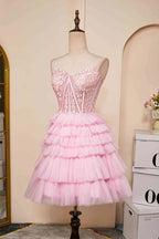 Vestido de fiesta rosa sin tirantes y con escote corazón en capas PD514