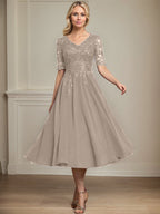 Vestido de gasa con encaje y lentejuelas para madre de la novia, corte A, escote en V y largo hasta la rodilla