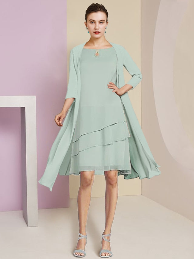 Vestidos de madre de la novia de corte A/princesa con escote joya y largo hasta la rodilla