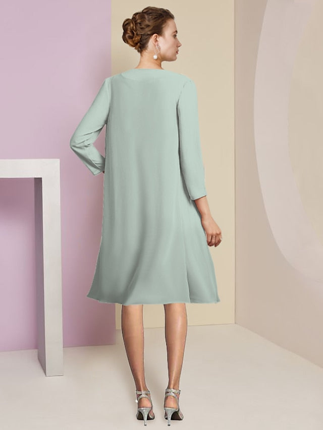 Vestidos de madre de la novia de corte A/princesa con escote joya y largo hasta la rodilla