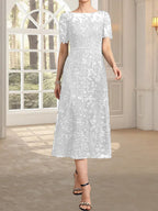 Vestido de madre de la novia de encaje con lentejuelas, corte A, escote ilusión y largo hasta la rodilla
