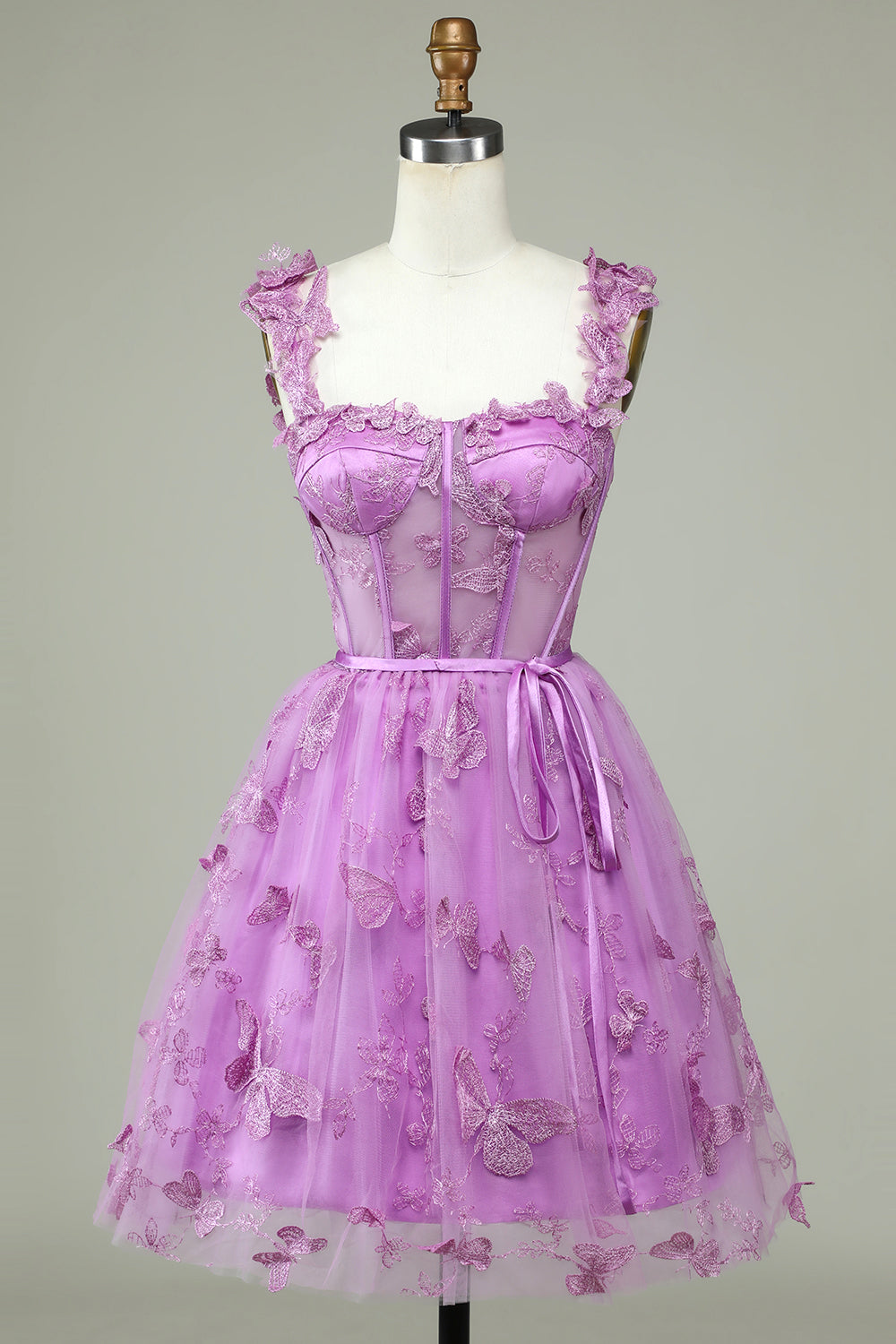 Bonito vestido de fiesta morado de corte A con corsé, corto y apliques