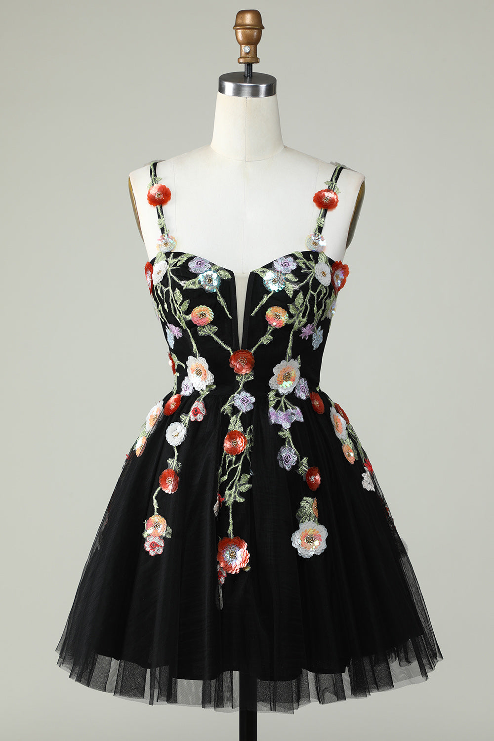 Vestido de fiesta negro de corte A con tirantes finos, lentejuelas y flores