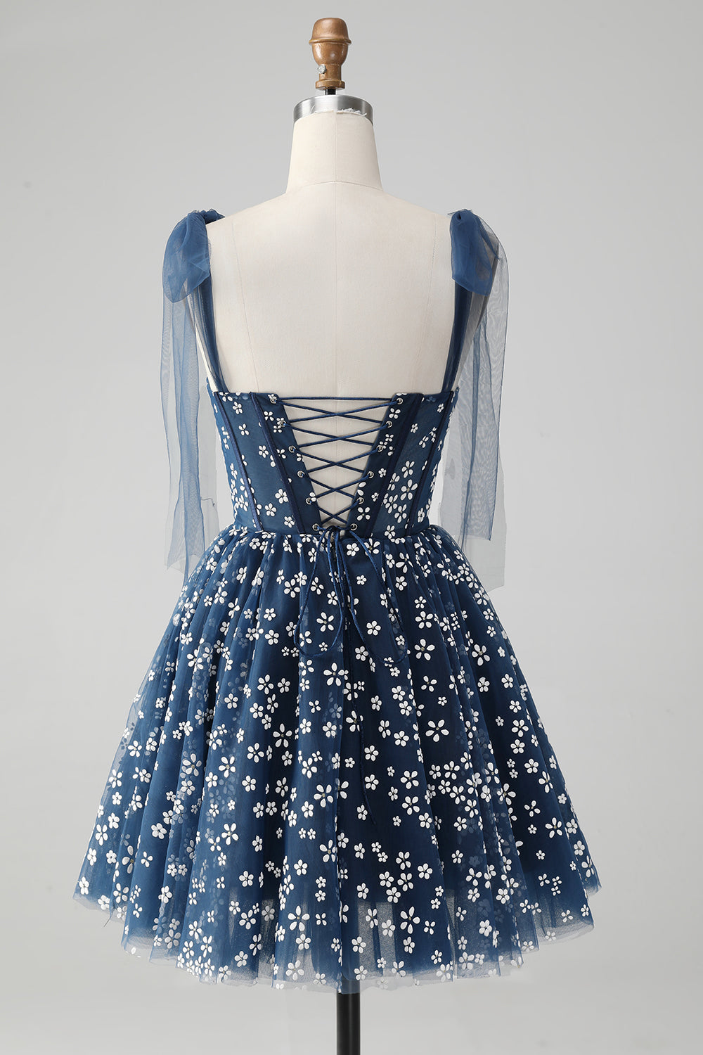 Vestido corto azul marino de fiesta con tirantes finos, estampado de corsé y corte en A