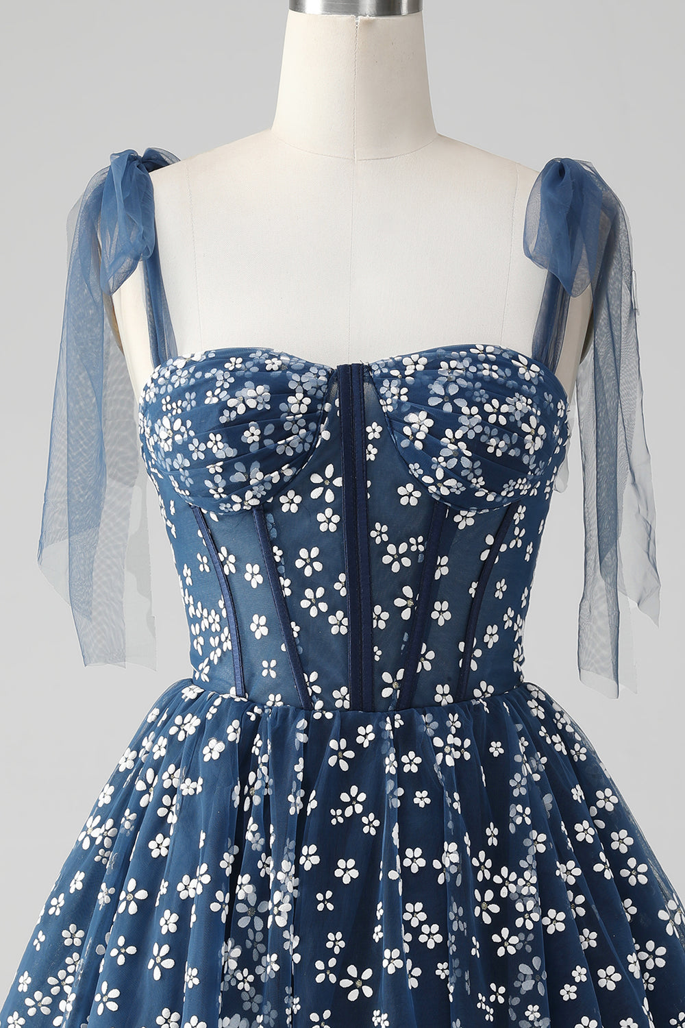 Vestido corto azul marino de fiesta con tirantes finos, estampado de corsé y corte en A