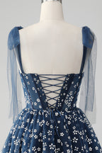 Vestido corto azul marino de fiesta con tirantes finos, estampado de corsé y corte en A