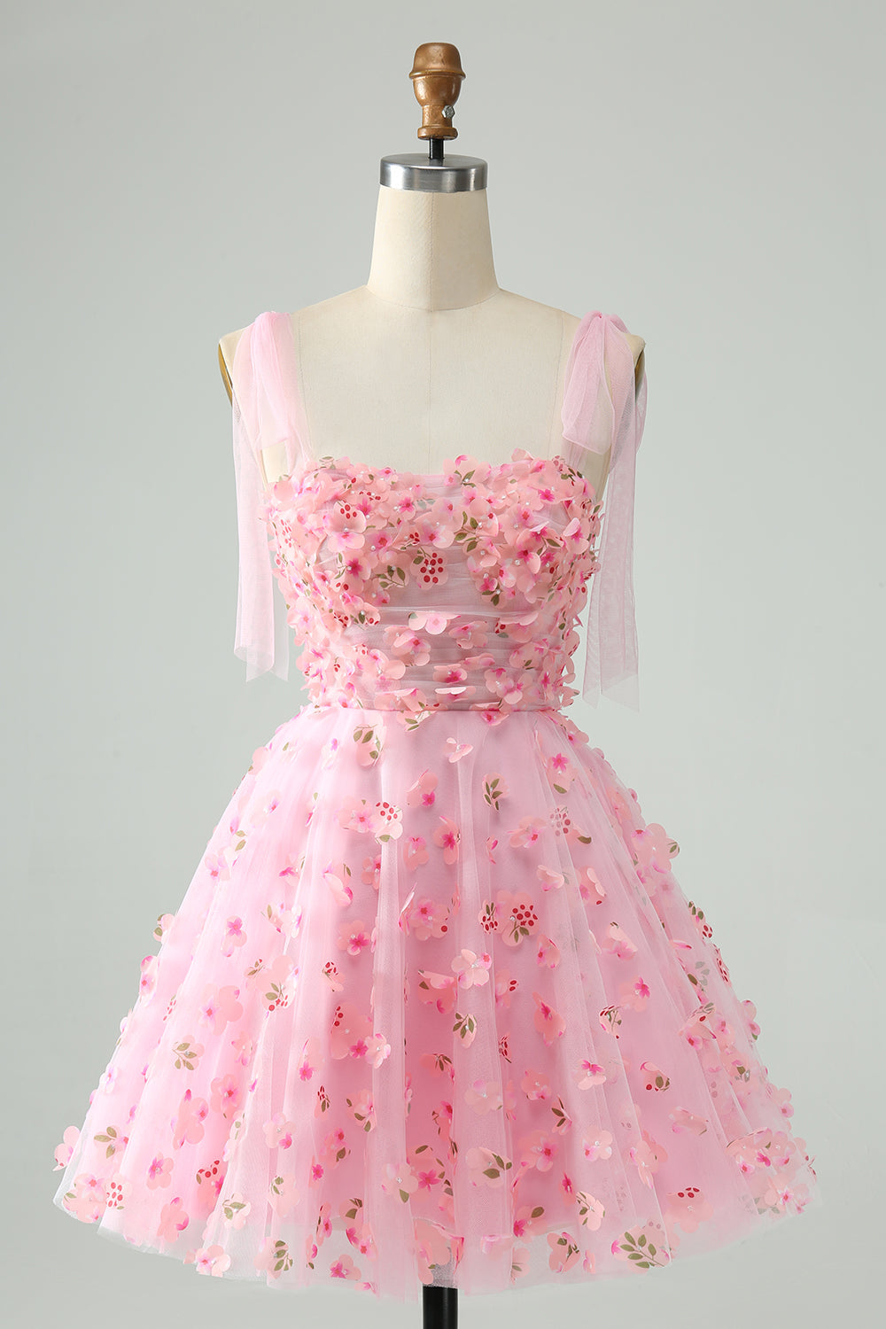 Bonito vestido de fiesta corto con corsé, perlas y corte en A en color rosa con apliques florales