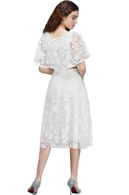 Vestido de fiesta corto de encaje con cristales y corte en A