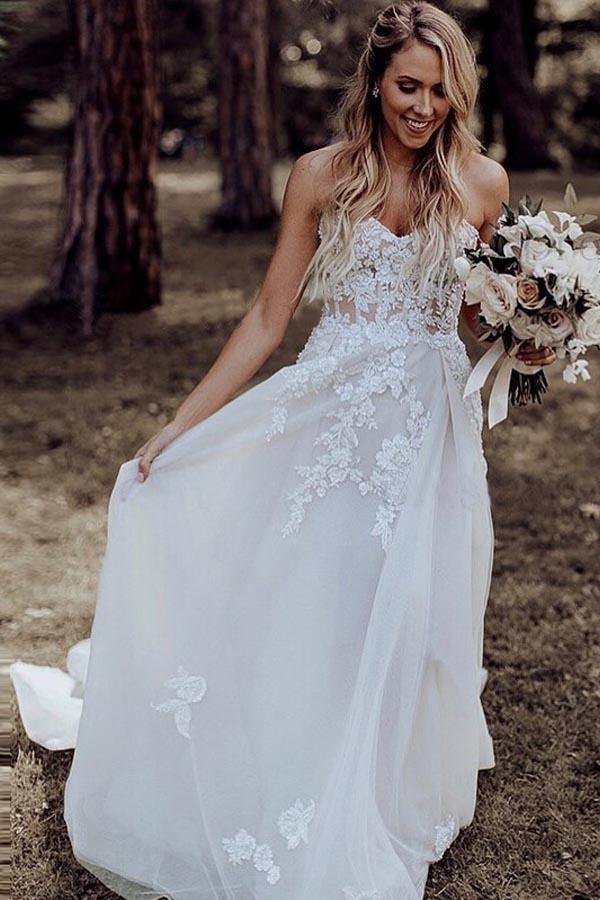 Vestido de novia de corte A con escote en forma de corazón y cola larga con apliques de cuentas WD393