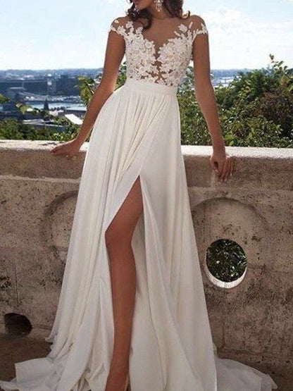 Vestidos de fiesta elegantes de gasa con apliques redondos y mangas cortas en forma de A