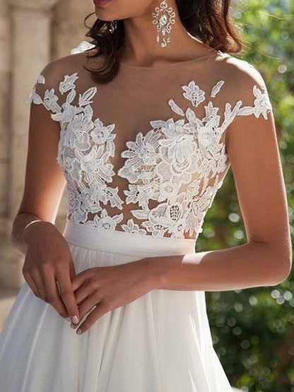 Vestidos de fiesta elegantes de gasa con apliques redondos y mangas cortas en forma de A